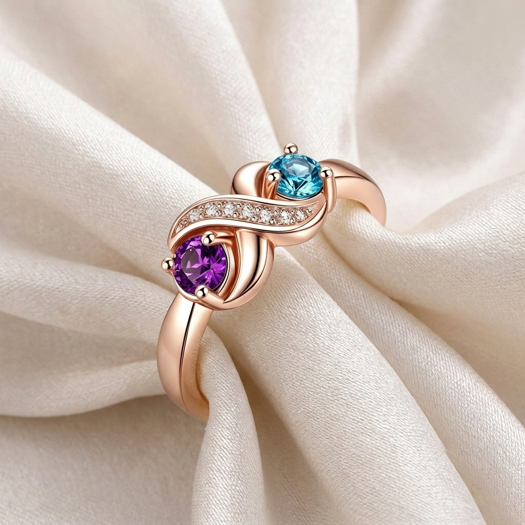 Custom two birthstone swirl engraved name ring side view