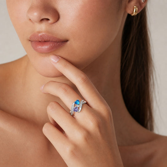 Custom two heart birthstone promise ring worn on hand