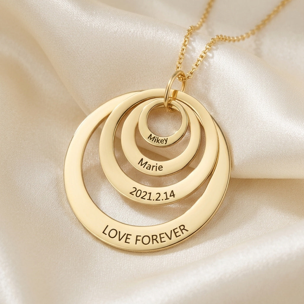 Three-layer silver disc pendant with custom family names.