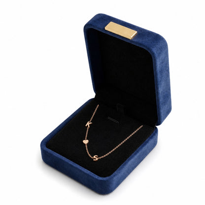 Initial heart necklace in a gift box