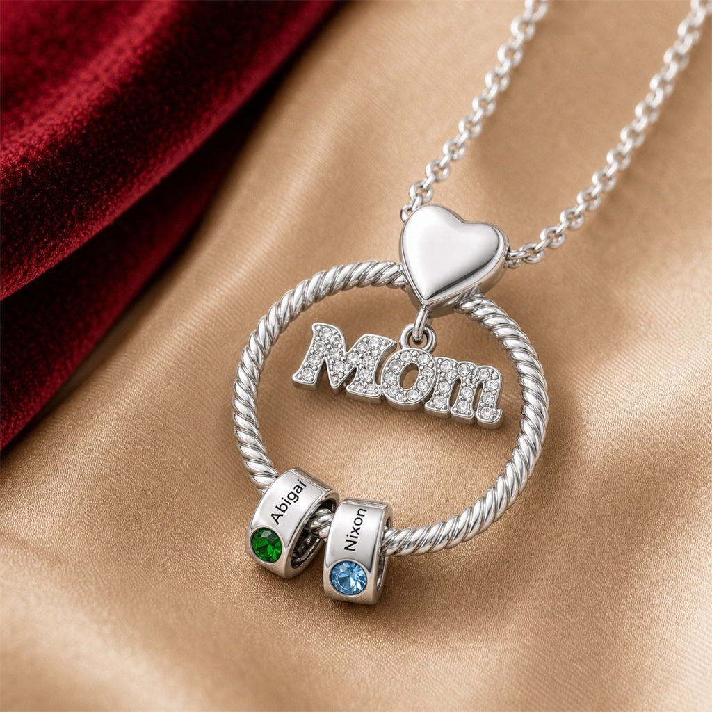 Engraved Mom name bead necklace closeup on silk