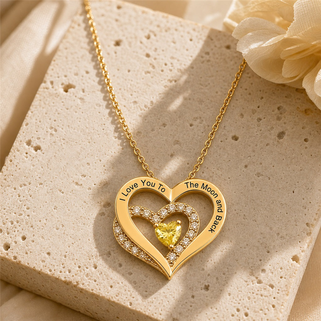 Engraved moon and back heart pendant close-up