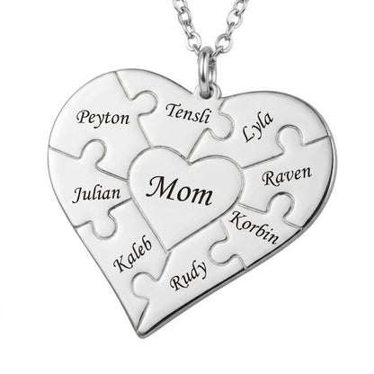 Large silver heart puzzle pendant with 8 family names.