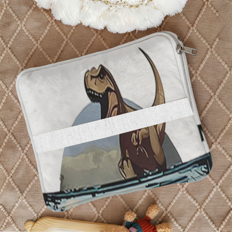 Folded dinosaur pillow with a zipper and white strap.