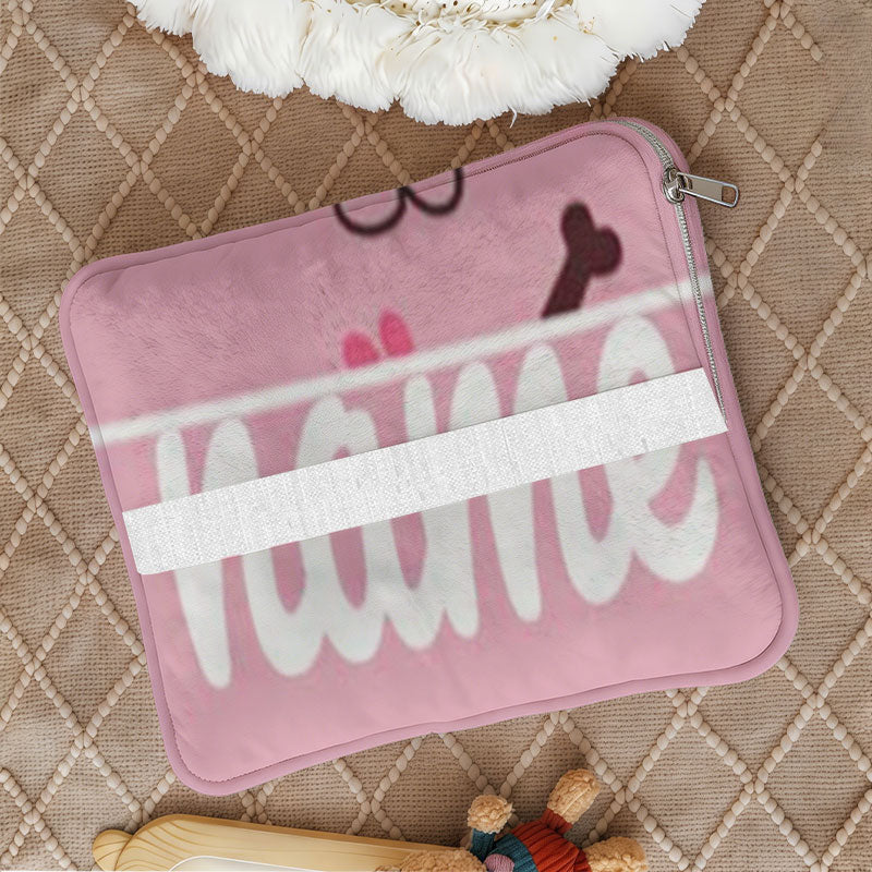 Close up of pink dog bone pattern pillow case