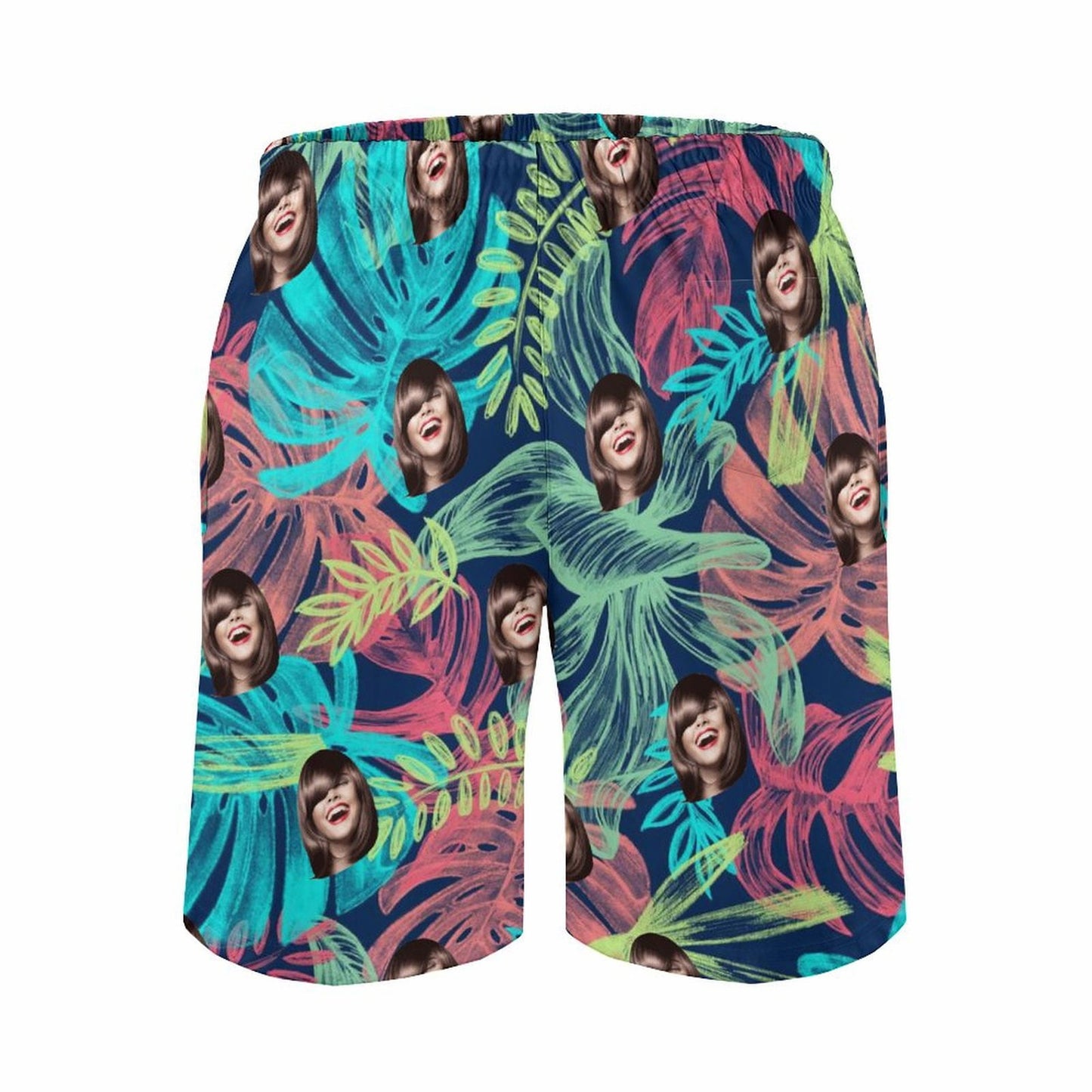 Personalized men's funny face beach shorts, tropical floral pattern.