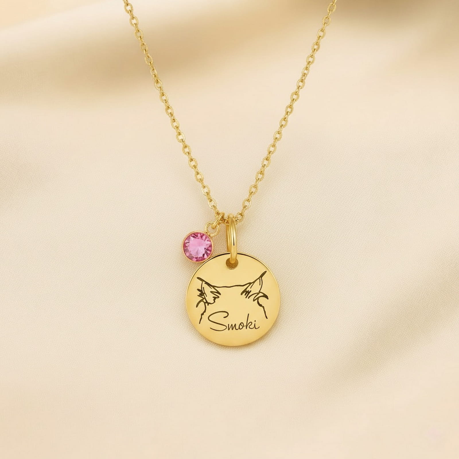 Gold birthstone pet name necklace with pink stone, personalized gift for women.