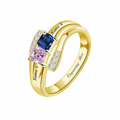 Gold personalized mother ring with two square simulated birthstones and name engraving.