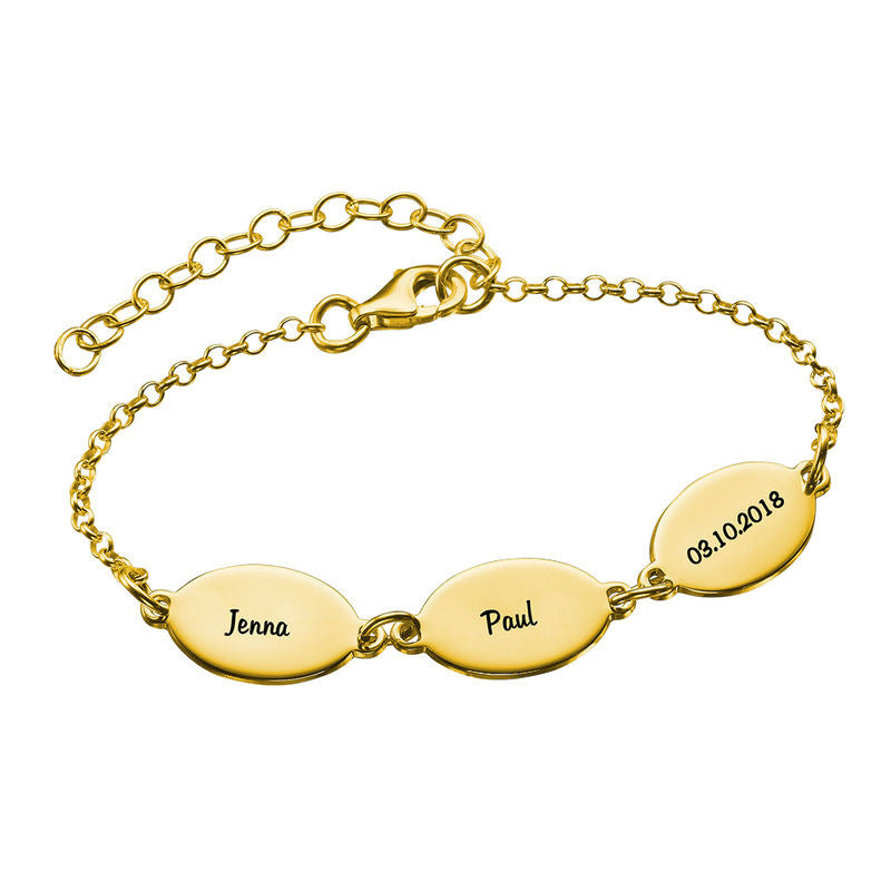 Gold plated custom name bracelet with engraved oval charms. Thoughtful family gift.