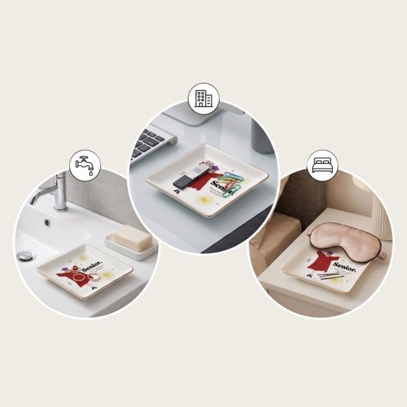 Graduation jewelry tray with rings on a nightstand