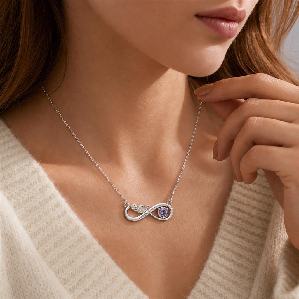 Woman wearing an infinity birthstone necklace