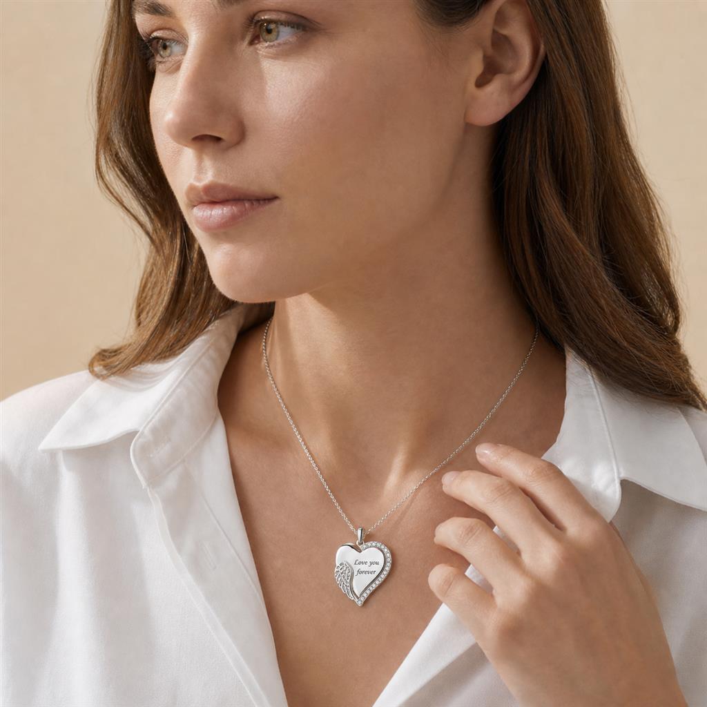 Woman wearing an angel wing heart necklace