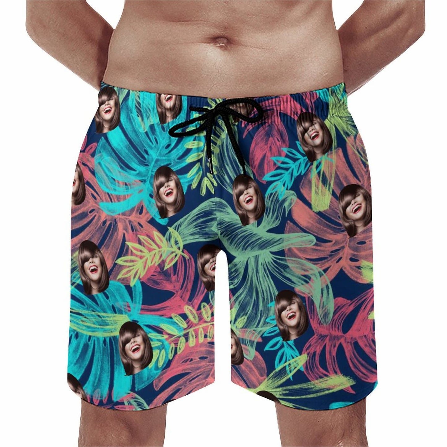 Men's funny face swim trunks model view. Custom tropical floral shorts.