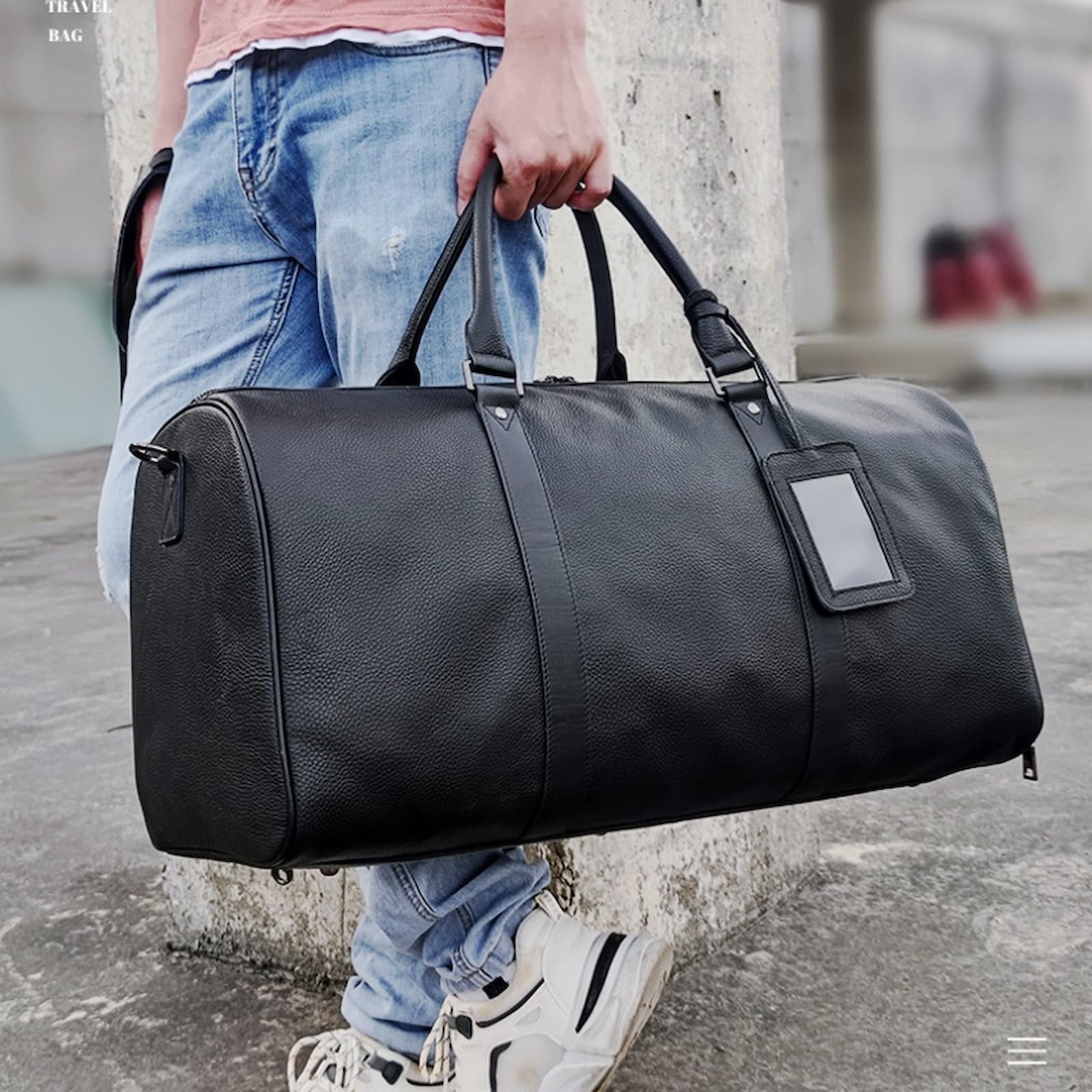 Professional black leather duffle bag suitable for business trips and carry-on use