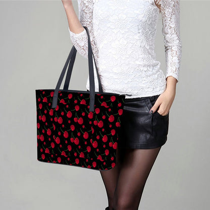 Woman with cherry print tote purse in street view. White dress.