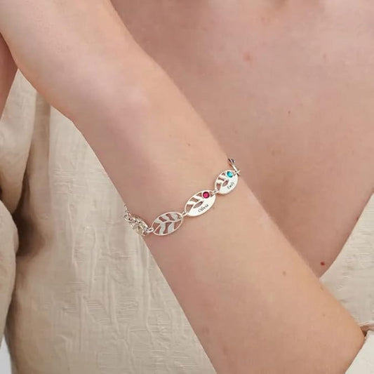 Model wearing Dainty Silver Personalized Mother Leaf Bracelet on wrist.