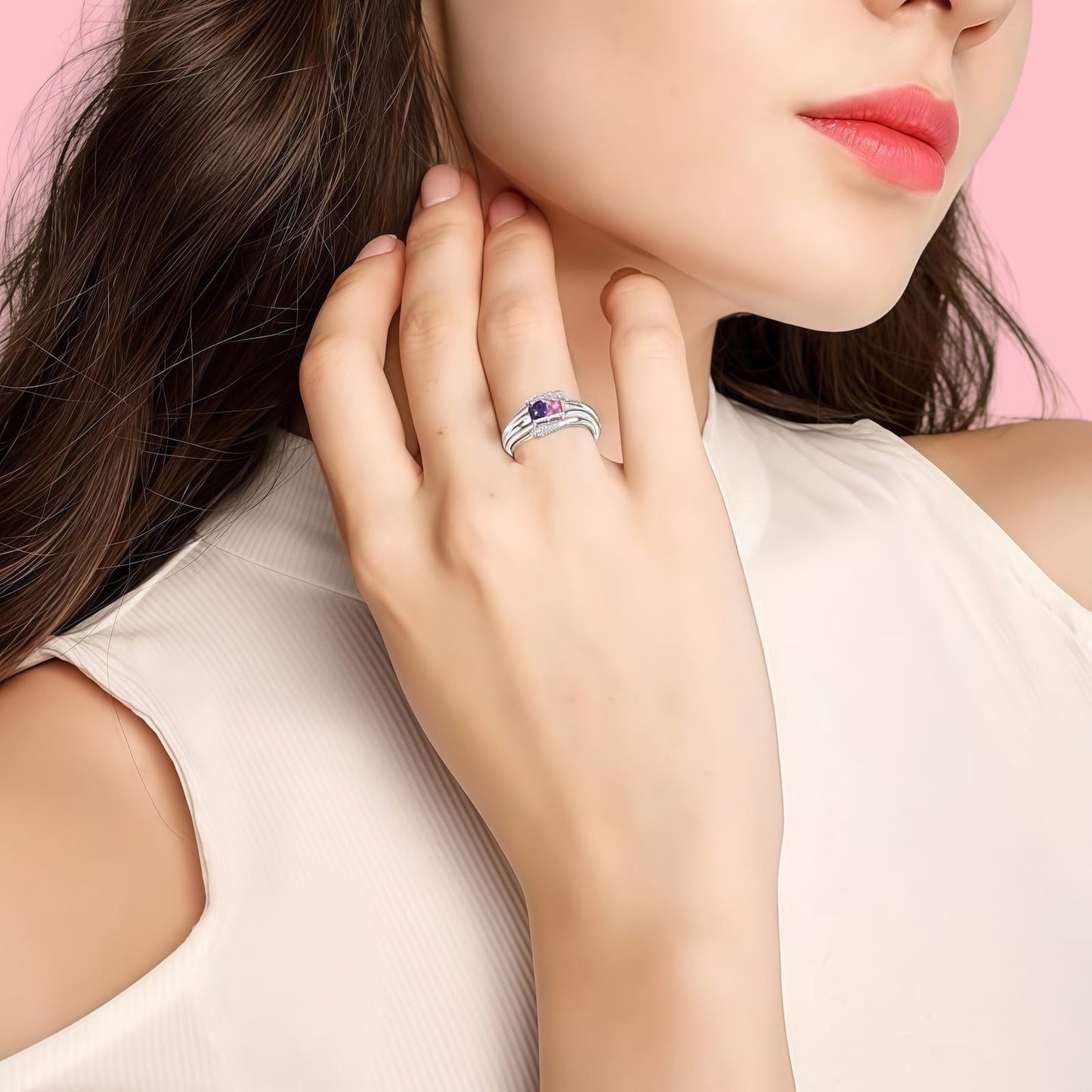 Model wearing silver personalized mother ring with purple and pink birthstones.