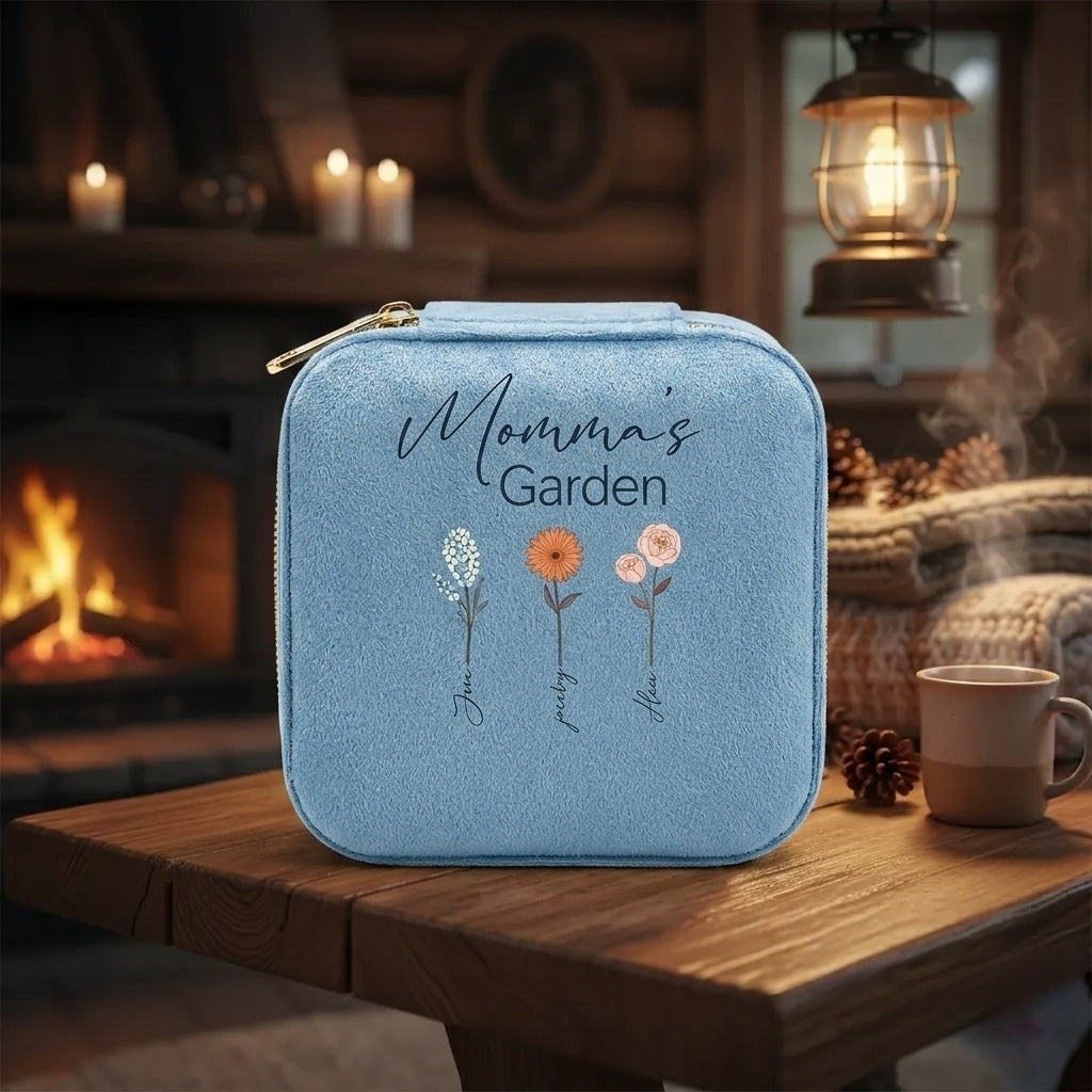 Blue velvet jewelry box with personalized flowers near fire