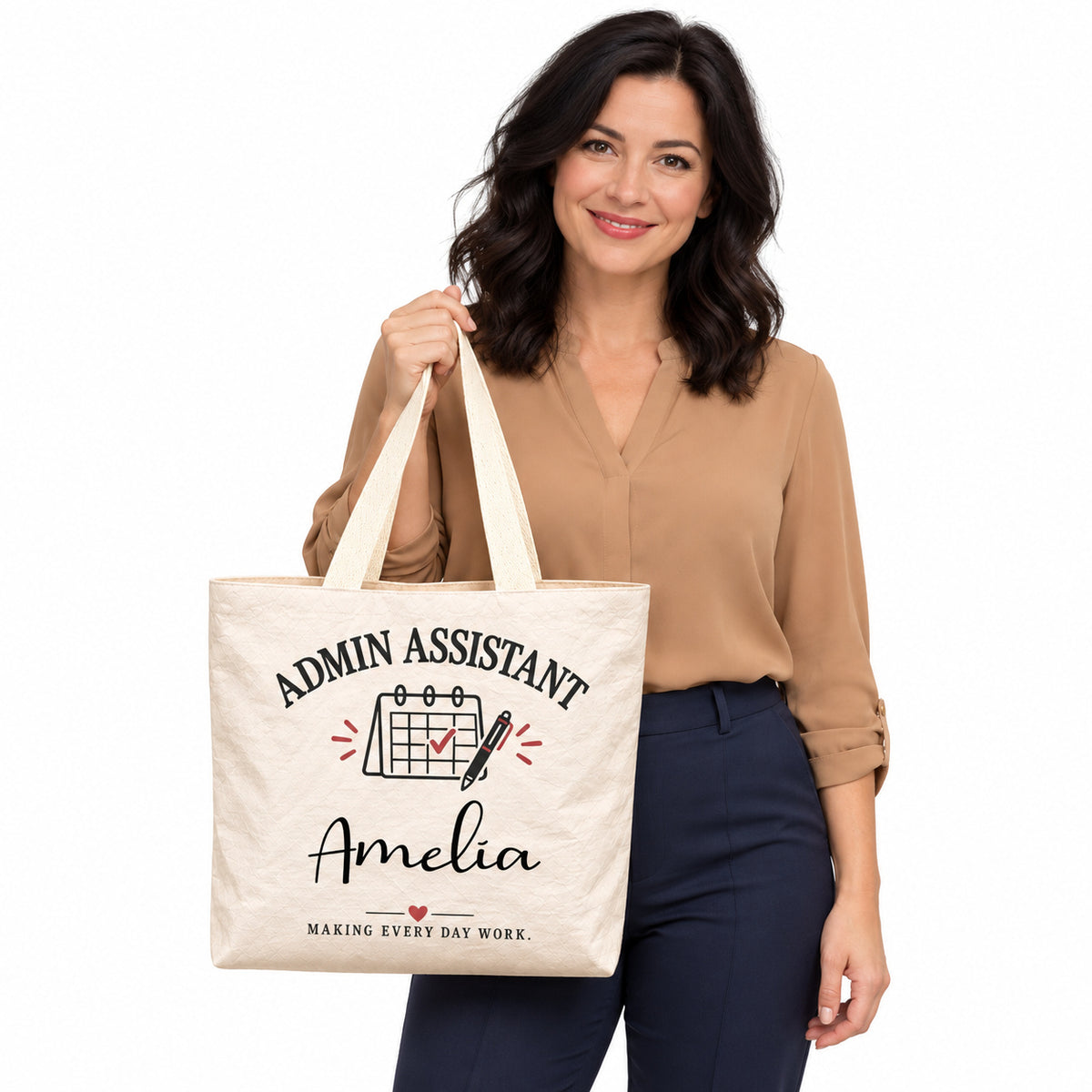 Cream Admin Assistant tote personalized with Amelia, displayed by a model against a white background.