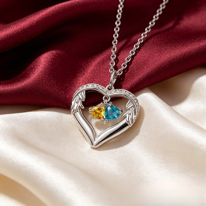 Silver angel wing birthstone necklace on satin