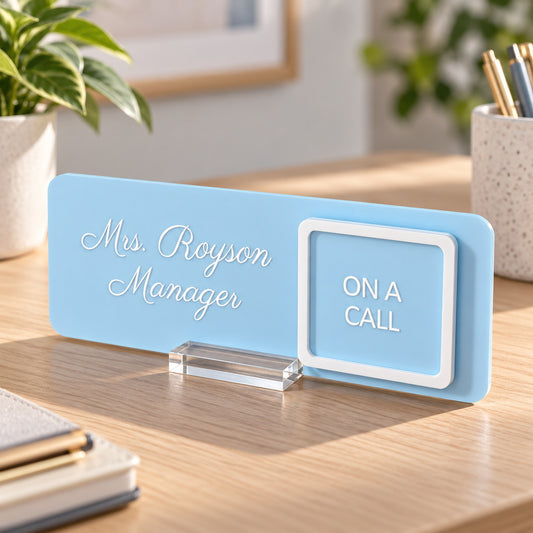 Sky blue office sign displayed on a desk using an optional clear acrylic stand