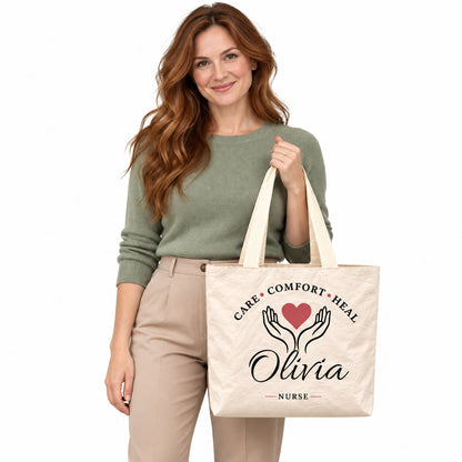 Cream Care Comfort Heal tote personalized with Olivia, displayed by a model against a white background.