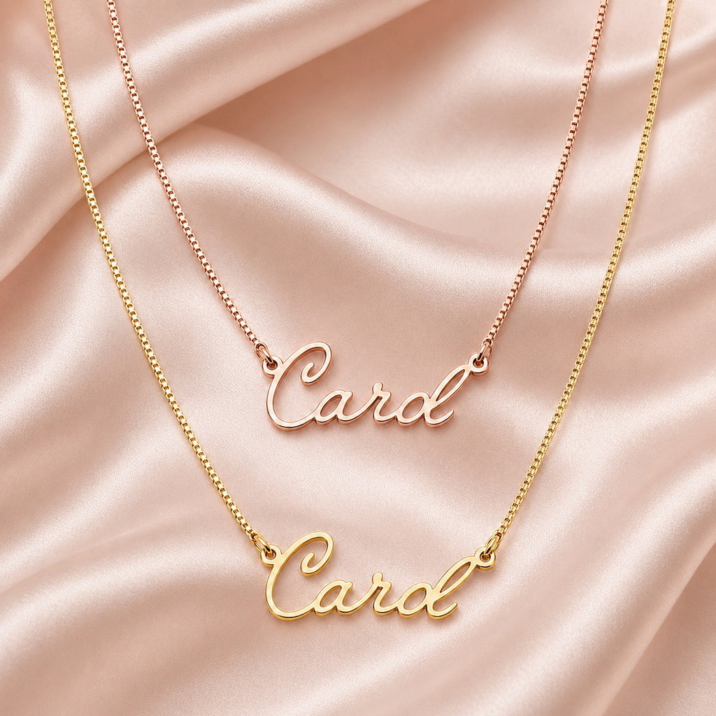 Layered rose gold and gold cursive name necklaces.