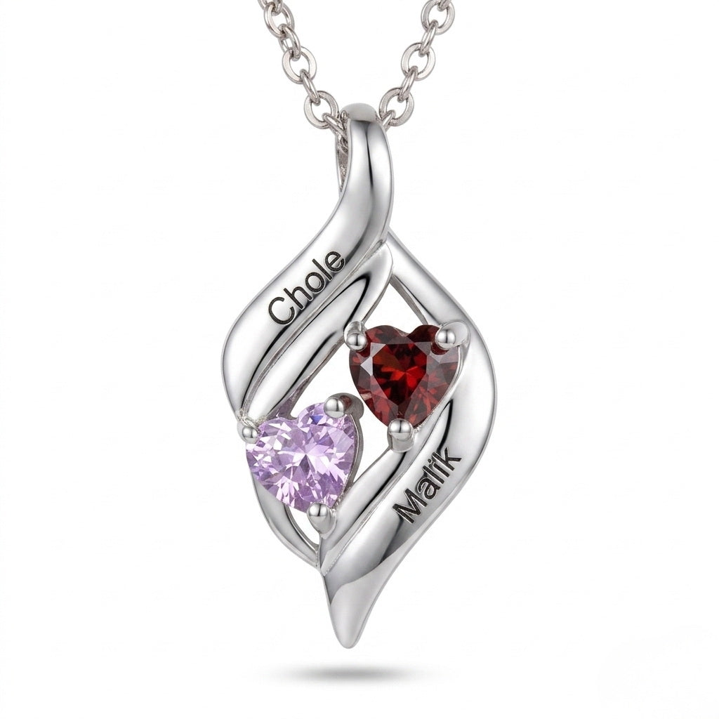 Silver double heart necklace with two names and gemstones.