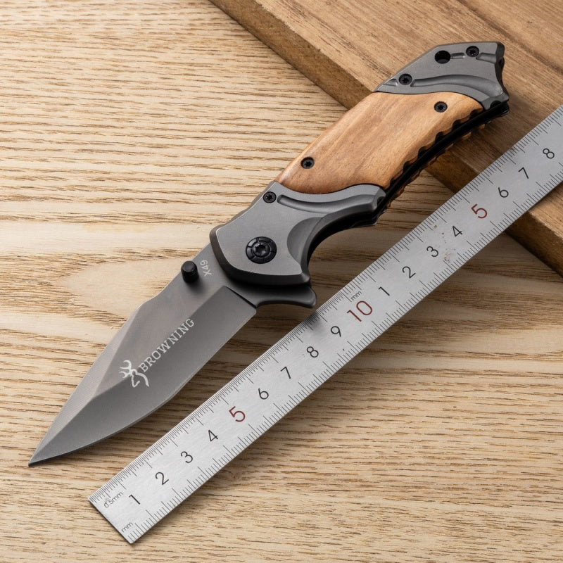 Personalized engraved pocket knife, fully open, showing the blade and handle.