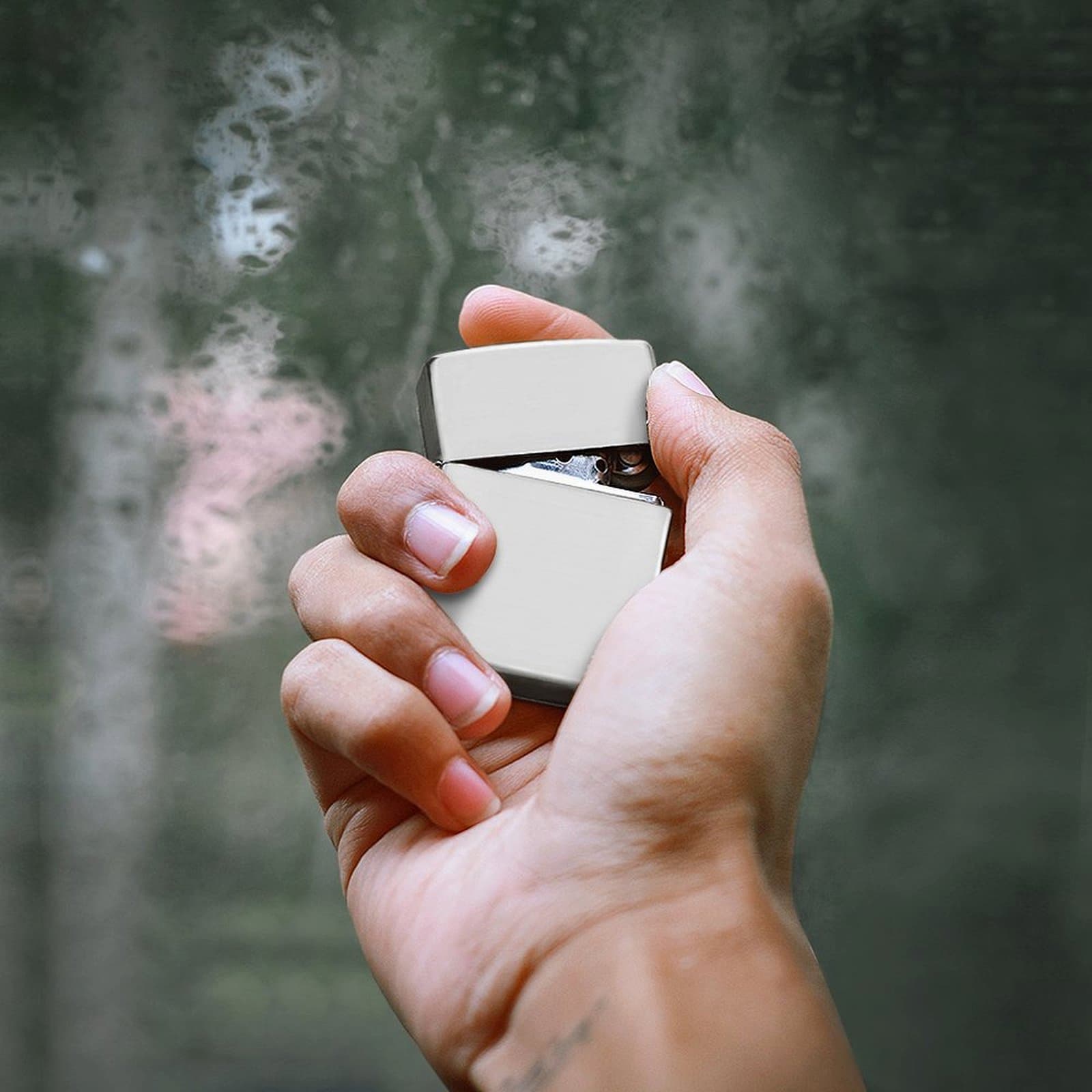 Hand holding a Personalized Engraved Lighter. Shows comfortable size and high-quality metal finish.