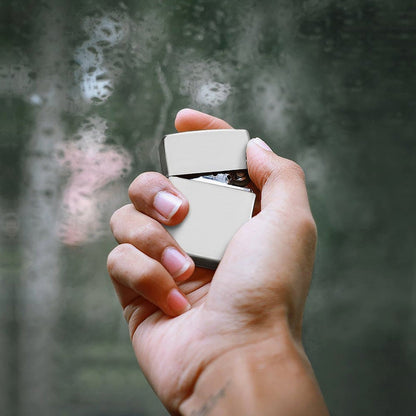 Hand holding a Personalized Engraved Lighter. Shows comfortable size and high-quality metal finish.