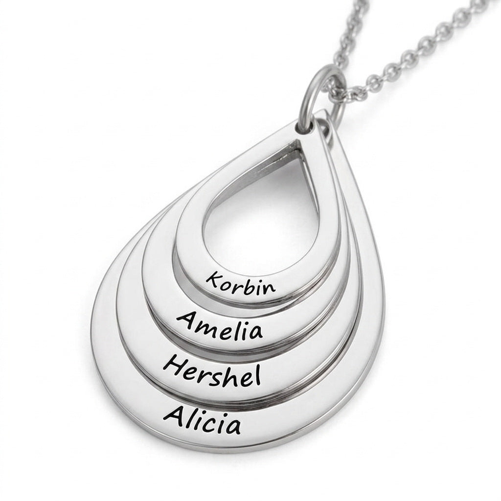 Silver teardrop pendant engraved with four family names.
