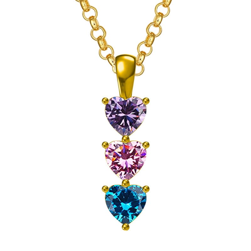 Close-up of the personalized three-heart birthstone pendant, with three unique colored gems.
