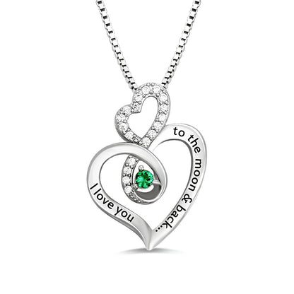 Silver heart pendant engraved with I Love You To The Moon.