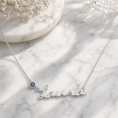 Personalized name necklace on marble