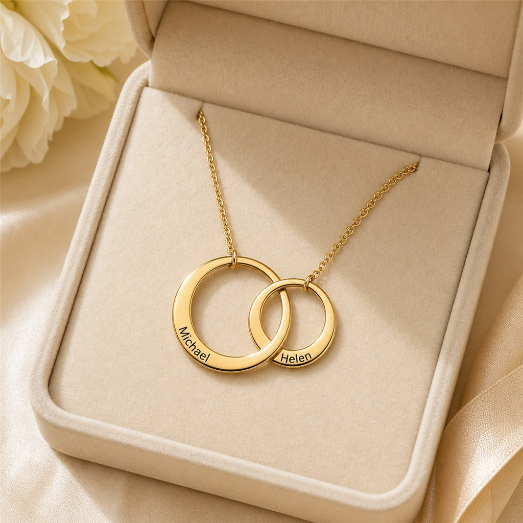 Personalized name rings necklace in a cream gift box