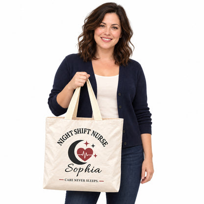 Cream Night Shift Nurse tote personalized with Sophia, displayed by a model against a white background.