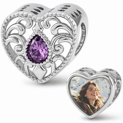 silver heart charm featuring a central heart-shaped amethyst surrounded by clear cubic zirconia and a custom photo locket
