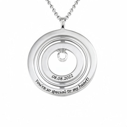 Personalized Sterling Silver Round Pendant Necklace. Custom engraved date and text shown.