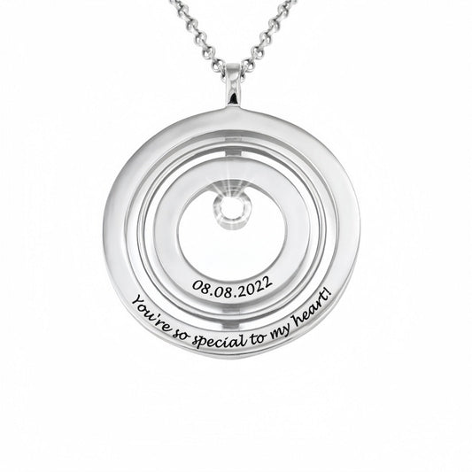 Personalized Sterling Silver Round Pendant Necklace. Custom engraved date and text shown.