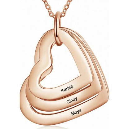 Gold triple heart pendant engraved with three custom names.