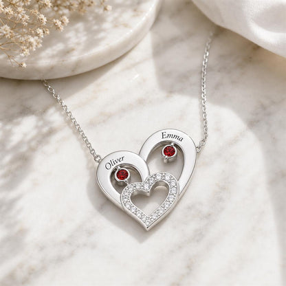 Two heart necklace on marble
