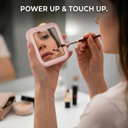 Portable power bank used as a makeup mirror for touch ups.