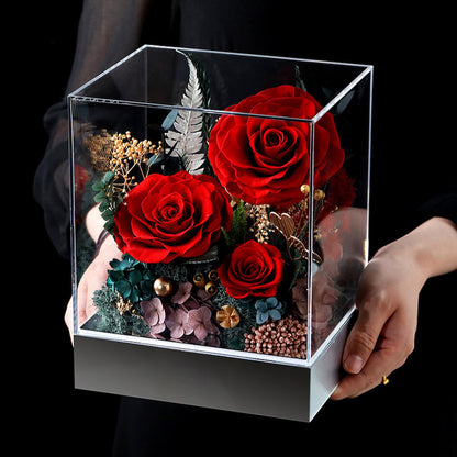 Beautiful birthday or Mother's Day gift: A red preserved floral arrangement in a transparent, dust-proof case.