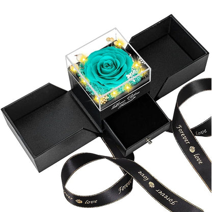 Preserved teal rose jewelry gift box with drawer and lights for romantic gift.
