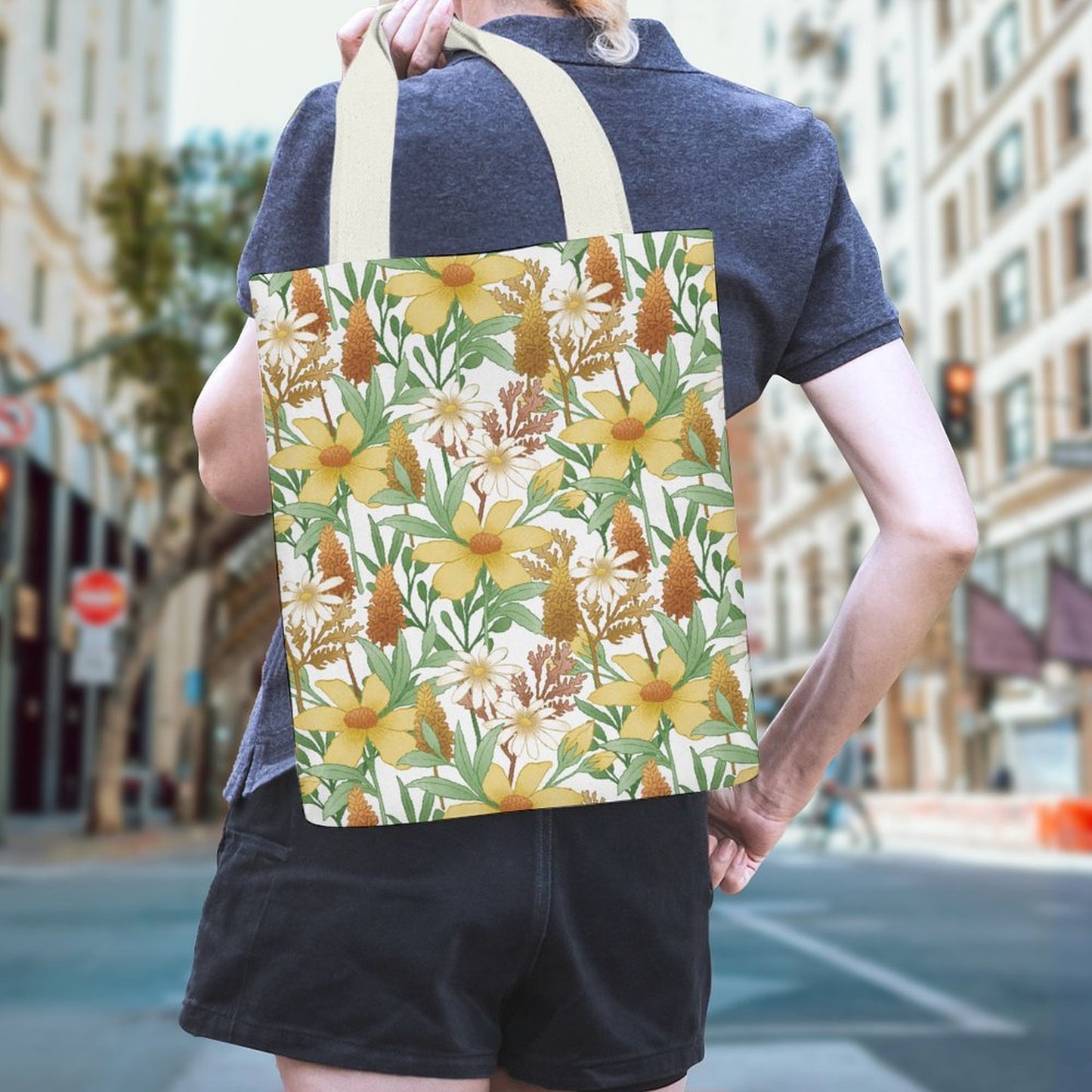 Reusable Canvas Tote Bag with floral print worn on the back; suitable for groceries.