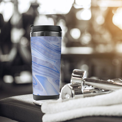 12.5oz reusable insulated coffee cup stainless steel tumbler in a gym setting.