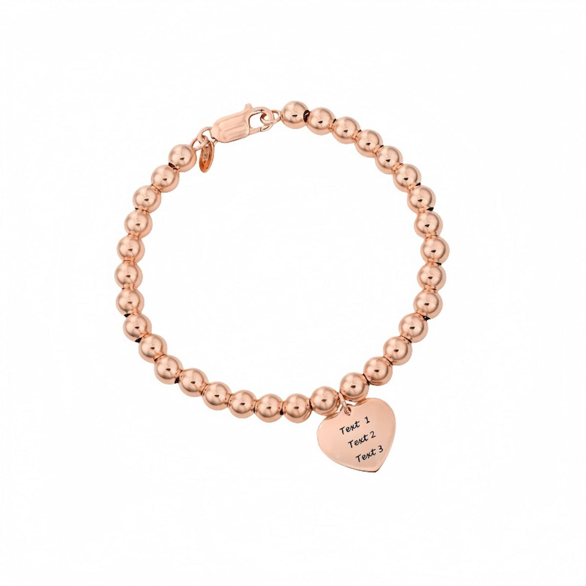 Rose gold plated bead strand bracelet with heart charm and engraving, shown on a model's wrist.