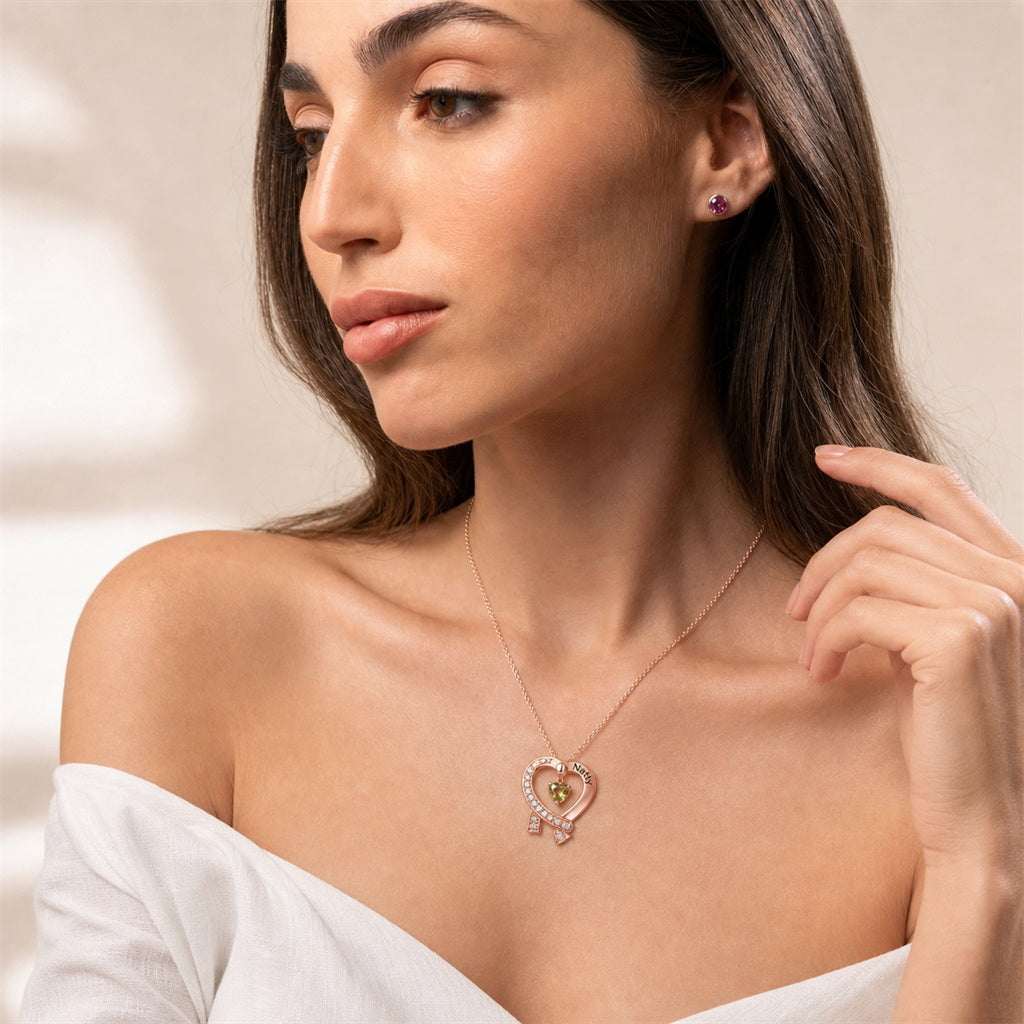 Woman wearing rose gold name and birthstone necklace