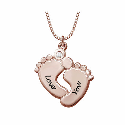 Rose gold personalized baby feet necklace. Engraved text, birthstone, new mom gift.